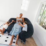 A young family on a premium Taylor made bean bag